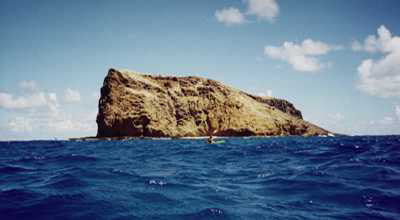 Moku Manu seen from the channel.